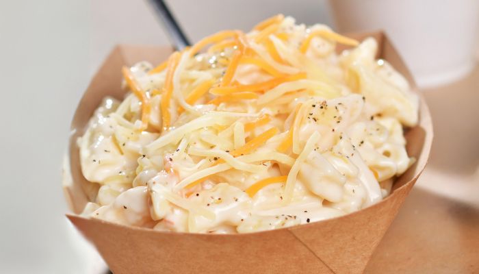 Bowl of creamy golden homemade mac and cheese served at the Rockin Chicken Shack restaurant in Wisconsin Dells.